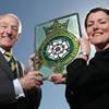 Michael Bannister, a former President of the Yorkshire Agricultural Society with his gift to the Society of a stained glass panel, and the panel’s designer, Julia Spall.