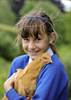 Charley Liversedge, from Nun Monkton Foundation Primary School, near York with one of the hens at the Countryside Days event at the Great Yorkshire 