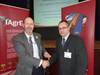 Jim Loynes left is presented with his award by IAgrE President Andy Newbold
