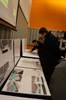 Visitors review visualisations and key project information at the Open Day event