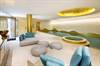 Poolside relaxation in the 8,900 sq. ft. basement that runs the entire length of the 145 ft. garden  