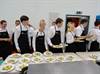 Harefield Academy catering students serving the Academy dinner