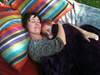 Shayla and her mom snuggling in her new hammock.