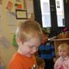 Toby Cleeter-Forsyth, 2 years 9 months, as a giant millipede makes its way up his arm.