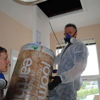 Pictured is Adrian Duffield with son Luke Duffield of Duffield Joinery carrying out the loft insulation for a landlord of Lighthouse Property Services. They were drafted in by Parr Energy Solutions to help with the insulations