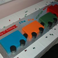 Pictured is The Old Station Nursery's train-themed birthday cake to symbolise the group's origins in a former railway station