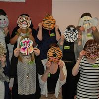 Pictured are staff from across the 13 settings showing off their face masks created as part of team-building activities during the 10th anniversary event