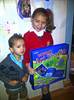 Sophie Merton from Afonwen, who was one of the winners of a national drawing competition organised by Cool Milk, pictured here with her younger brother Micha