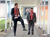 Rob Jones and Russell Moore celebrate with an impromptu kickabout