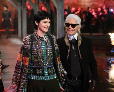 Model Stella Tennant and Karl Lagerfeld walk the runway at Chanel's Métiers d'Art show at Linlithgow Palace