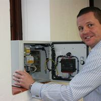Jason Davis MD of ACES using an Energy Management System