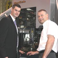 l-r Chris Hellyer Sales Manager Sodi-Tech EDM Ltd and Martin Spooner Managing Director Promach 3D securing a deal at MACH 2012