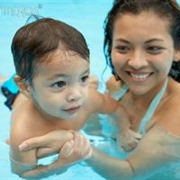 Hispanic mom baby swim