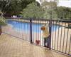 Boy at Pool Fence