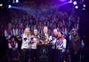 L-R Gold medalists Anna Watkins Helen Glover Greg Rutherford Barney Story and Sarah Storey with Noah Stewart