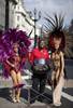 In Regent Street carnival dancers Jennice Crystal Price and Lolo Page from Trinidad and Tobago wearing costumes by Bacchanalia and steel pannist for CSI Steel band Dexter Yearwood