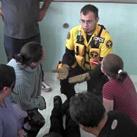 Alejandro Del Llano (in the yellow uniform) who directs  Volunteer Ministers activities in Latin America