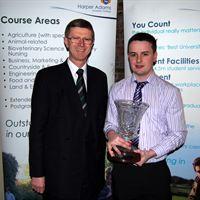 Dr David Llewellyn presents the President's Award to Phillip Gault.