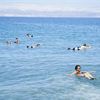 Floating people in Dead Sea