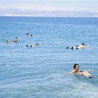 Floating people in Dead Sea