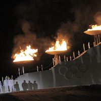 Three Olympic torches lit