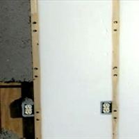 Wall insulation should be long lasting and not settle (see foam insulation on right). Cellulose insulation (left) can settle, leaving gaps in the wall cavity.