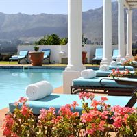 Relaxing by the pool at Mont Rochelle