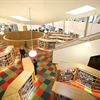 The library incorporates a feature teardrop ceiling structure with roof lights