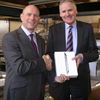 Graham Porter, left, of True with iPad winner Colin Thornby of Keemlaw Catering Equipment