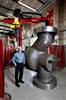Arc Energy's Alan Robinson with a Rotating Head machine