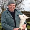 Stephen Akrigg with one of his goats