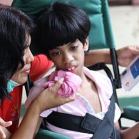 Angel, a 10-year old girl with cerebral palsy.