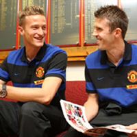 Manchester Uniteds Anders Lindegaard och Michael Carrick 