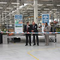 Mr Thorwaldsson, Mr Maciejewski and Mr Osyra about to cut the ribbon