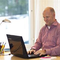 Tobii's CEO Henrik Eskilsson using the eye-controlled laptop prototype