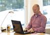 Tobii's CEO Henrik Eskilsson using the eye-controlled laptop prototype