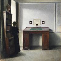 Vilhelm Hammershöi, Interiör med skrivpulpet och ung kvinna, ca 1900