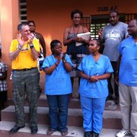 Scientologist Ayal Lindeman in the yellow Volunteer Minister T-shirt after one of the recent seminars provided in Haiti.