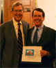 Pasadena Mayor Bill Bogaard (left) and Tim Bowles, Human Rights Director of the Church of Scientology Pasadena and Director of International Development of Youth for Human Rights International, in Pasadena City Council chambers.
