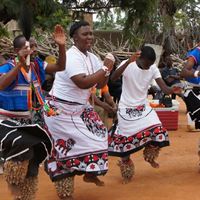 Local sangomas (traditional healers) perform for King and Queen Molefe and the Volunteer Ministers. 