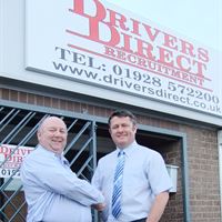 From left to right: Gethin Roberts and Paul Speed from Drivers Direct celebrating their successful expansion