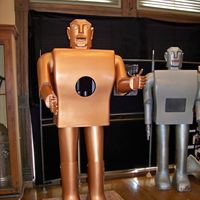 Replica of Elektro the robot standing with the original, 2010