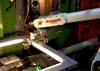 Kawasaki Robot machine load / unload with vision system