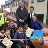 Cutting the ribbon at Goldfield Court
