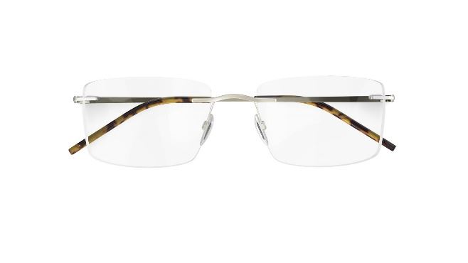 A pair of glasses with a metal frame
AI-generated content may be incorrect.