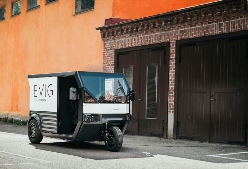 A small vehicle parked in front of a building
AI-generated content may be incorrect.
