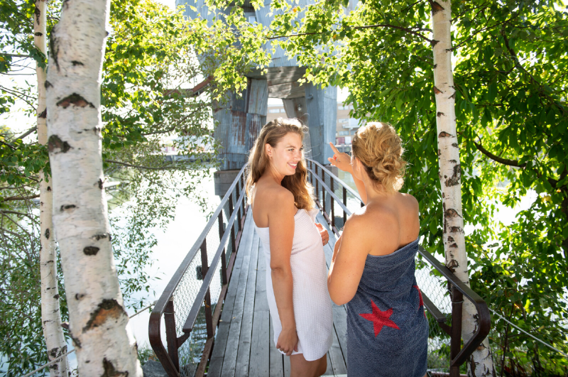Two women standing on a bridge

AI-generated content may be incorrect.