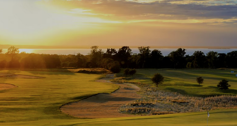 A golf course with a sand trap
AI-generated content may be incorrect.
