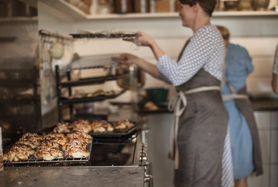 A person in a kitchen
AI-generated content may be incorrect.