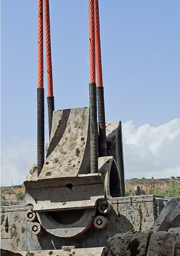 A large metal object with red tubes
AI-generated content may be incorrect.